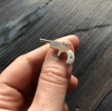 Mодель мініатюрного золотого Деррінжера 1мм калібру з накладками зі слонової кістки